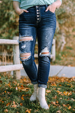 BUTTON FLY DISTRESSED JEANS